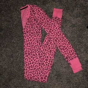 Pink leopard print pajama onesie